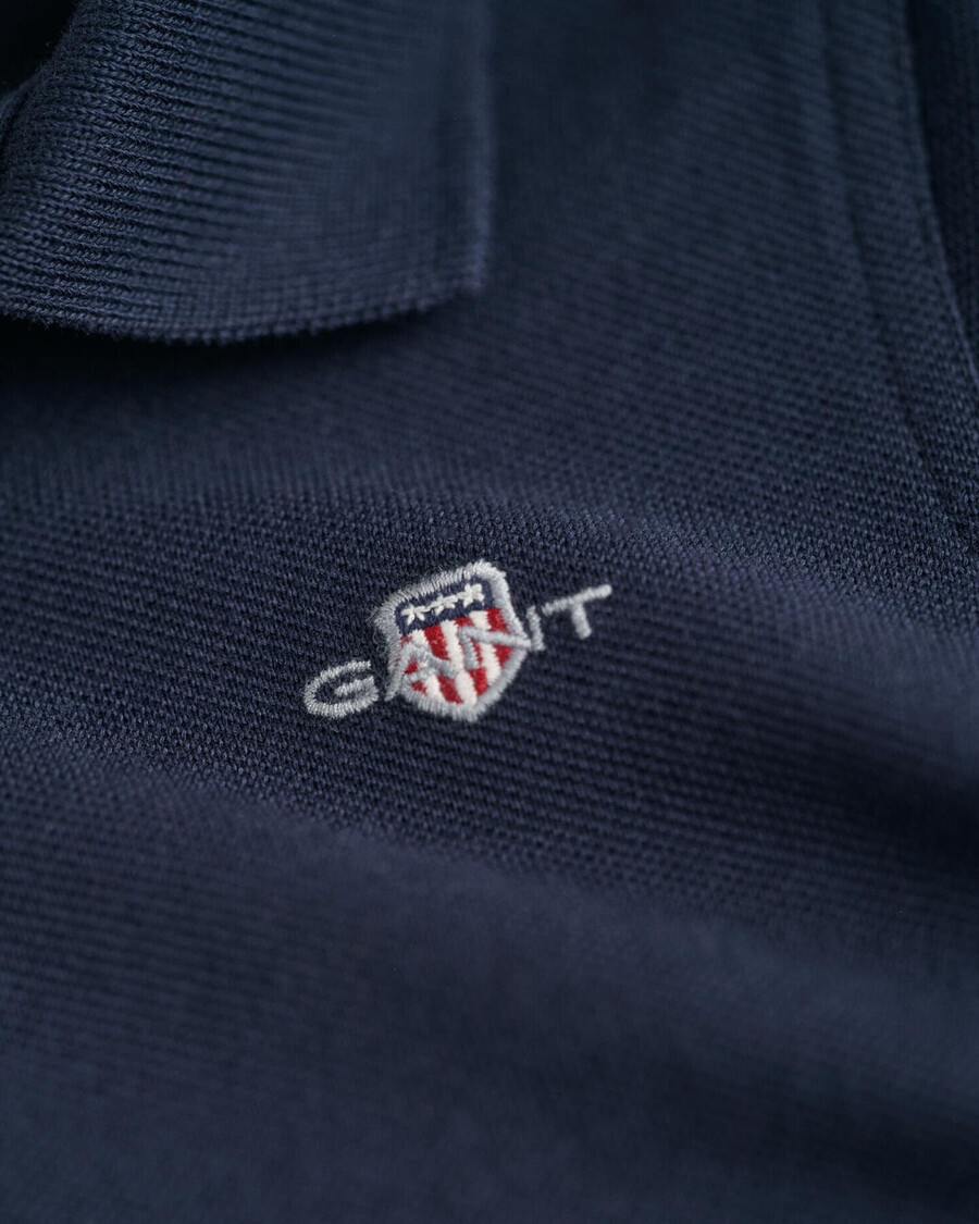 camisa polo infantil shield piqué - azul noite