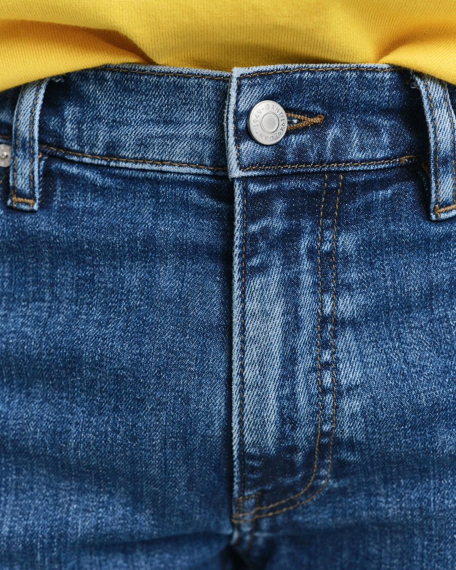 calça jeans slim fit com lavagem clara - azul médio vintage