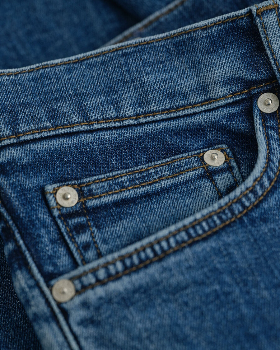 calça jeans slim fit com lavagem clara - azul médio vintage