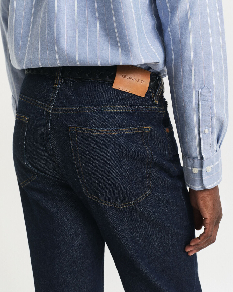 calça jeans reta - azul escuro cru