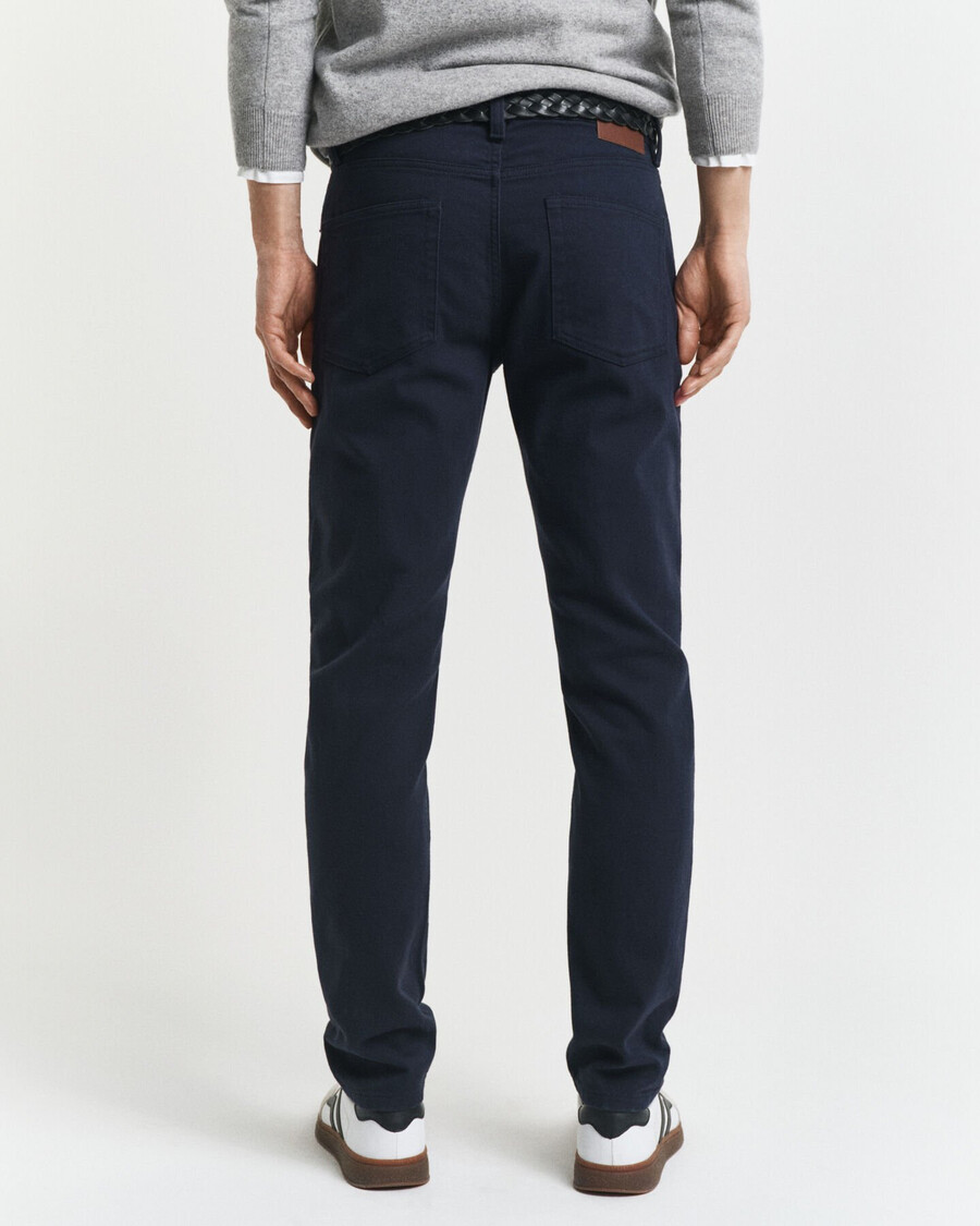 calça jeans slim fit em sarja macia - azul noite