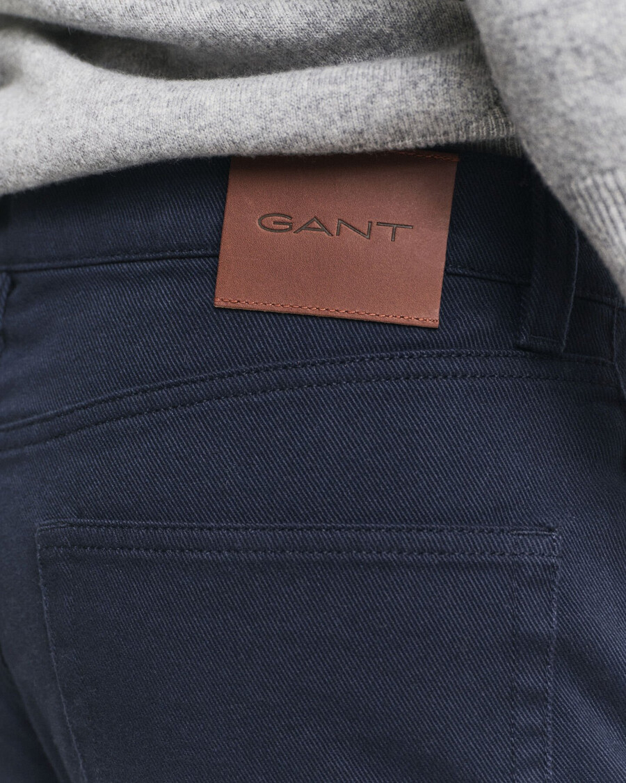 calça jeans slim fit em sarja macia - azul noite