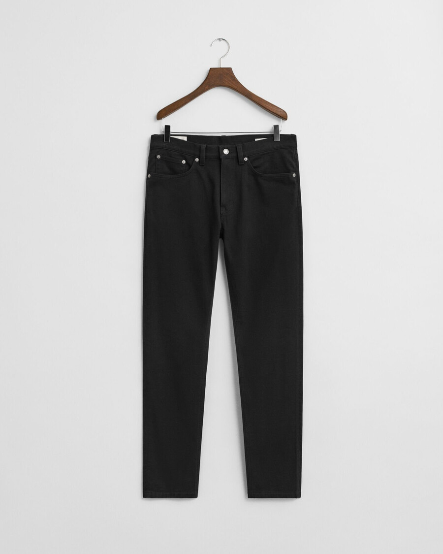 calça jeans slim fit em sarja macia - preta