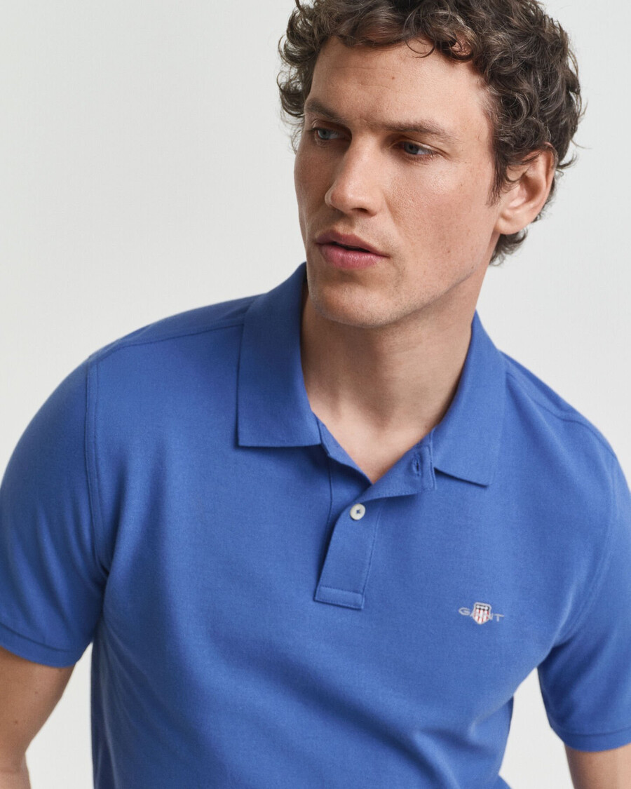 camisa polo shield piqué de corte regular - azul intenso