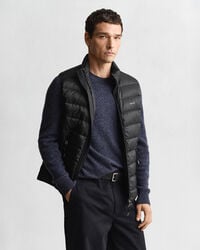 colete leve de plumas - preto