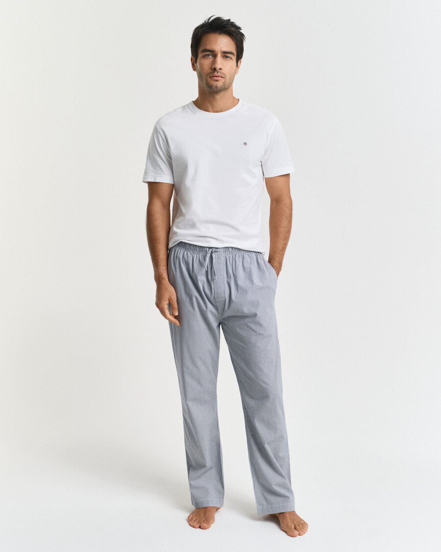 calça de pijama listrada em popeline - azul persa
