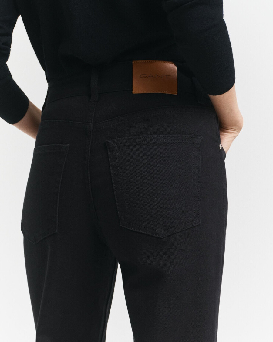 calça jeans preta flare slim fit - preta