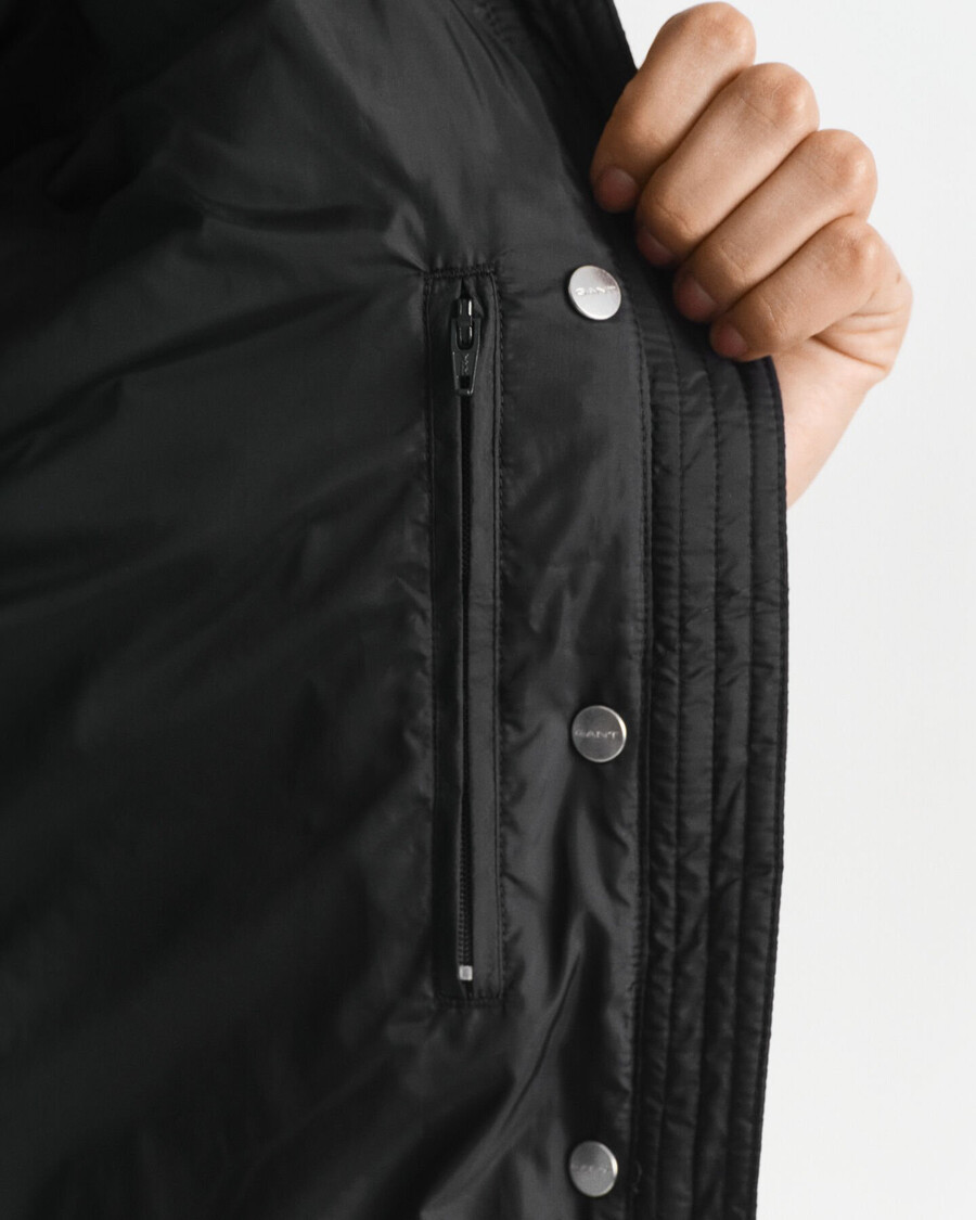 colete leve de plumas - preto